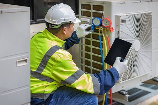 Professional Heat Pump Repair technician working in Camp Pendleton, CA